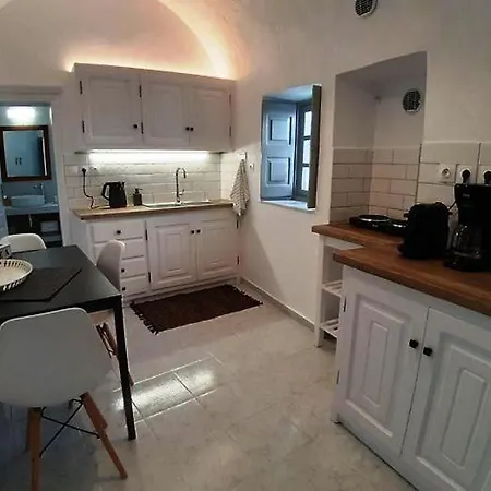 Golden Sunset Οία